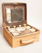 An Asprey & Co. leather clad travelling vanity case