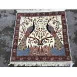 A Tabriz ivory ground 'Peacock' rug, 122 x 120cm