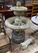 A large circular reconstituted stone garden fountain, diameter approx. 90cm. height 140cm.