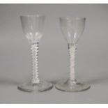 Two 18th century double series opaque twist stem cordial glasses, 14cm tall