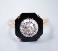 An 18ct gold diamond set black onyx dress ring, size Q, gross 4.6 grams