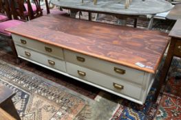 A large modern painted four drawer coffee table on wrought iron feet, length 180cm, depth 80cm,