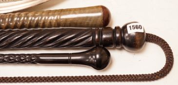 Four assorted canes to include a tapering horn example, a woven example, etc