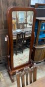 A Victorian style mahogany cheval mirror, the rectangular plate enclosing hanging space and
