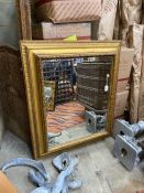 A large rectangular and giltwood and gesso wall mirror, width 95cm, height 110cm