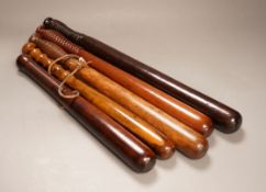A collection of five assorted 19th century constabulary truncheons in varying woods