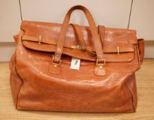 A large Italian brown leather bag