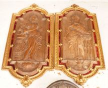 A pair of 19th century French ormolu mounted bois durci plaques, 50cm