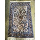 A Tabriz peach ground part silk pictorial rug, 180 x 111cm