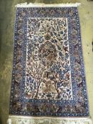 A Tabriz peach ground part silk pictorial rug, 180 x 111cm
