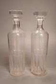 A pair of Baccarat for Hermes glass decanters, 29cm