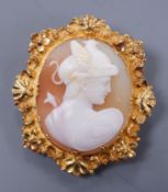 A Victorian yellow metal mounted cameo brooch carved with a bust of Hermes, 4.5cm