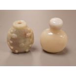 A Chinese jadeite snuff bottle and a glass snuff bottle