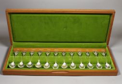 A cased set of twelve commemorative Royal Horticultural Society flower spoons, with silver gilt