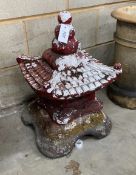 A painted reconstituted stone pagoda garden ornament, height 58cm