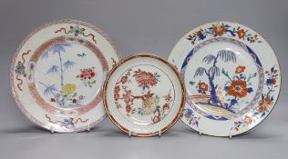 An 18th century Chinese export famille rose plate, similar saucer and an 18th century Chinese vert