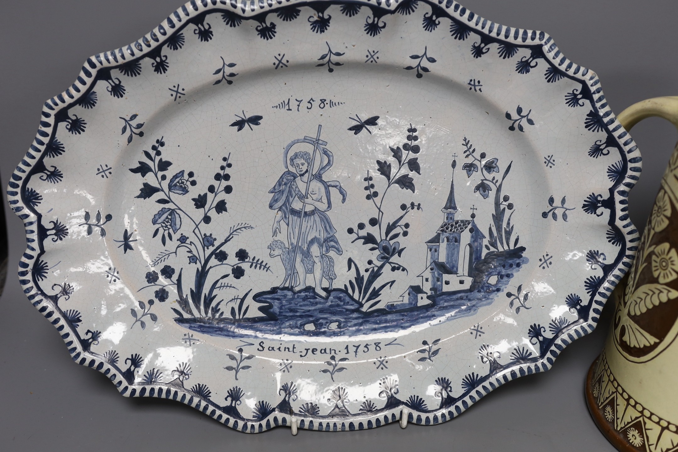 A Brannum sgraffito jug and a French faience serving dish, 42cm - Image 2 of 6