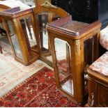 A pair of early 20th French birds eye maple glazed cabinets and central mirror, formerly a cabinet