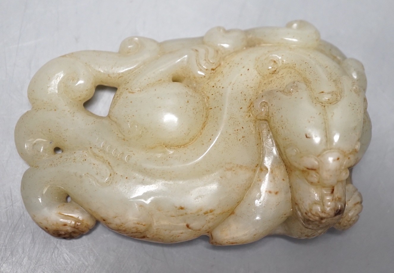 A Chinese pale celadon jade chilong carving, 10cm - Image 3 of 4