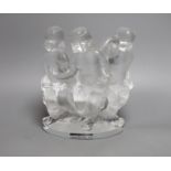 A Lalique glass model of three putti, boxed,18 cms wide,