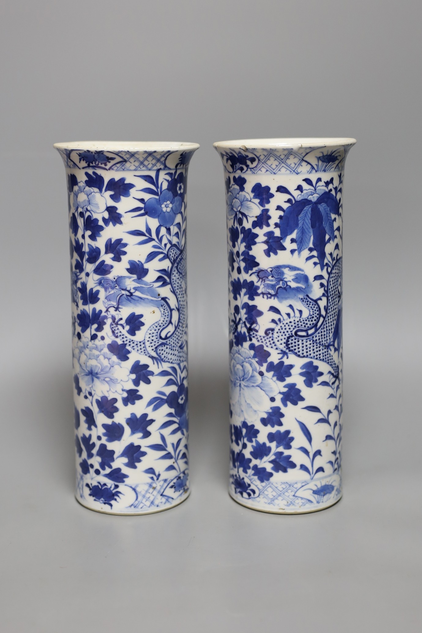 A pair of late 19th century Chinese porcelain sleeve vases, 26cm