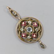 An Edwardian yellow metal, aquamarine, ruby and seed pearl set drop pendant, overall 55mm, gross