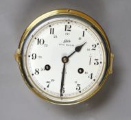 A Schatz Royal Mariner bulkhead clock, with key,17 cms diameter,