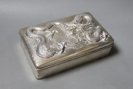 A Chinese Export white metal mounted cigarette box, by Wang Hing, Hong Kong, the lid decorated