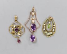 Three assorted yellow metal and gem set drop pendants including a 9ct, peridot and seed pearl, 33mm,