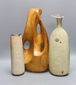 A carved elm abstract sculpture and two Joanna Constantinidis Studio pottery vases, tallest 44cm