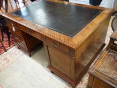 A mid 20th century French satinwood banded mahogany pedestal partner's desk, length 150cm, depth
