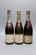 A bottle of 1955 Brut Imperial Moet & Chandon champagne together with two Moët Chandon, Dry Imperial