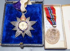 Honourable Order of the Grand Star Primrose League neck badge and a Romanian Jubilee medal