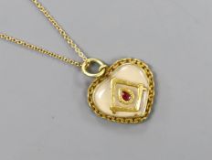 A yellow metal and cabochon gem set heart shaped masonic pendant, 16mm, on a 9ct chain, gross 4