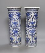 A pair of 19th century Chinese blue and white sleeve vases 30.5cm