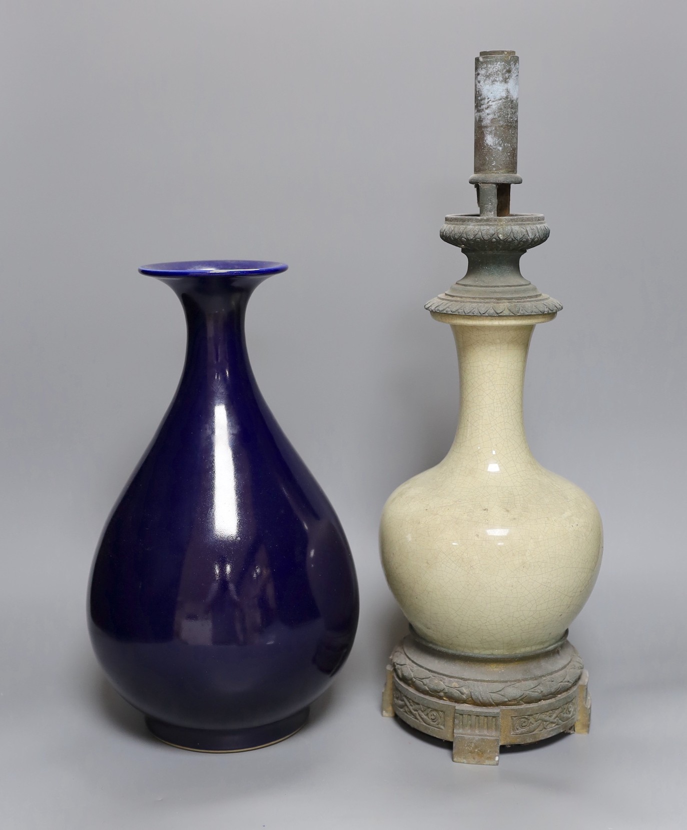 A Chinese blue glazed vase, Yongzheng mark to base but later and a Chinese crackle glazed vase