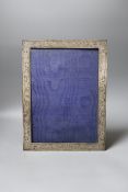 An American? engraved sterling mounted rectangular photograph frame, height 34.4cm.
