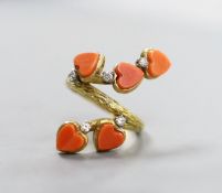 A 1970's modernist 18ct gold, five stone heart shaped coral and five stone diamond set dress ring,