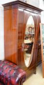 An Edwardian Maple & Co. marquetry inlaid mahogany mirrored door wardrobe, width 104cm, depth