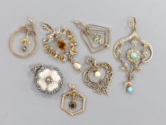 Seven assorted mainly early 20th century pendants, including 9ct, seed pearl and turquoise, white