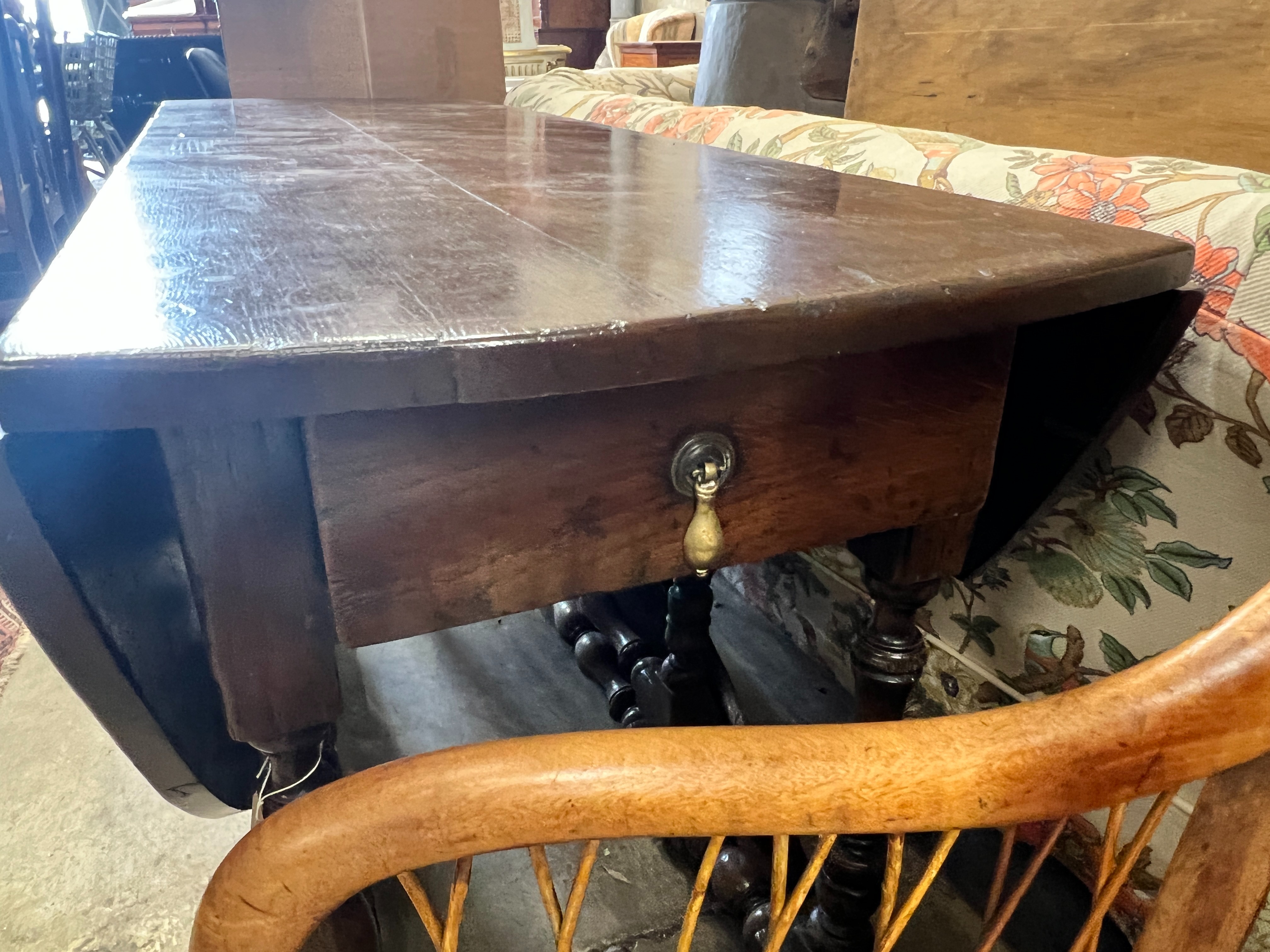 An early 18th century style oak oval topped gateleg dining table, (one leaf in need of repair), - Image 3 of 5