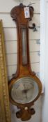 A Victorian walnut wheel barometer, height 102cm