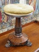 An early Victorian rosewood circular piano stool, height 49cm