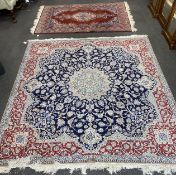 A North West Persian blue ground part silk rug, 220 x 217cm together with a similar smaller red