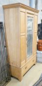 A late Victorian ash mirrored door wardrobe, length 122cm, depth 54cm, height 205cm