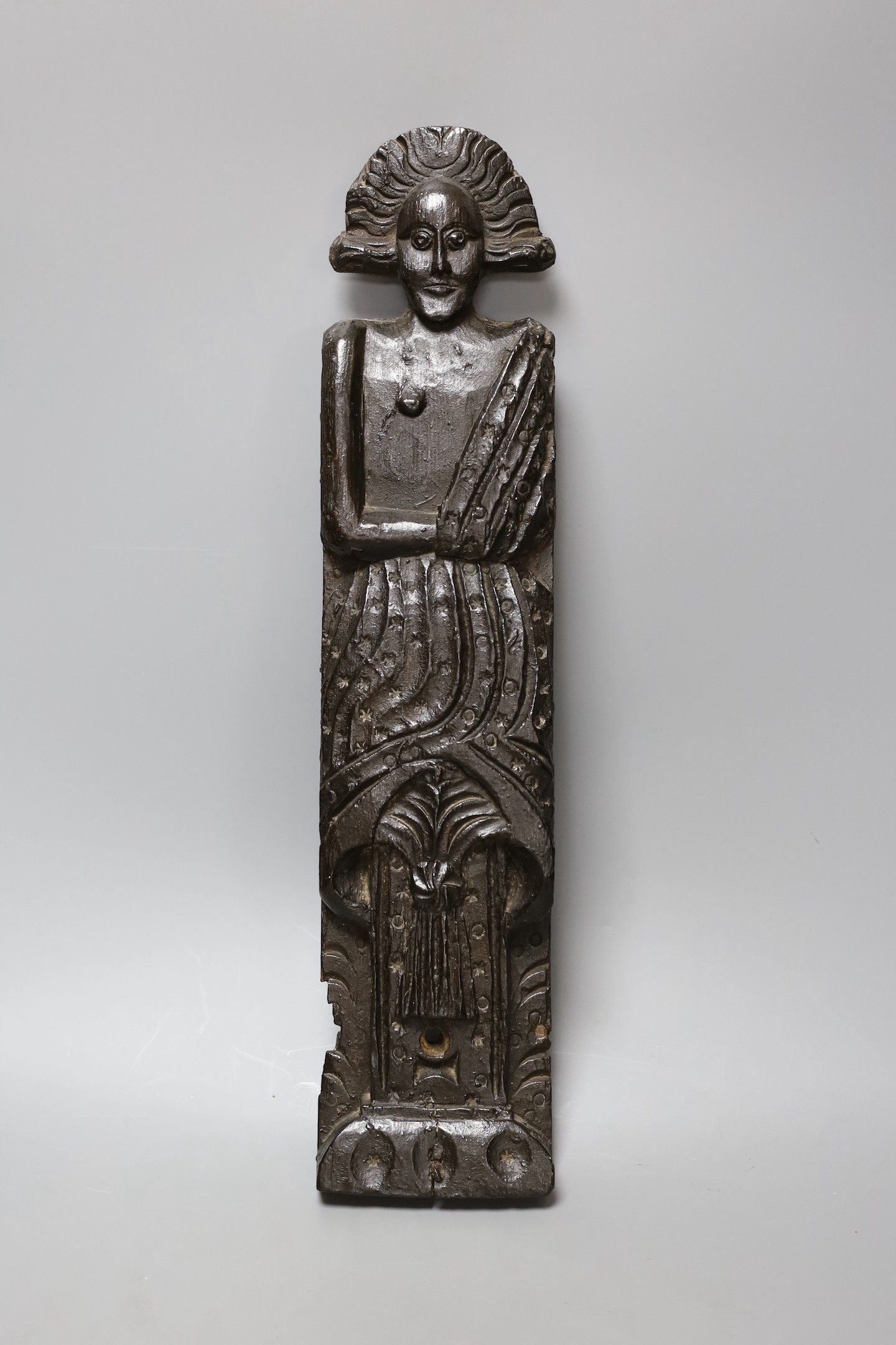 A 17th century carved oak appliqué figure of a lady, 47x10.5cm