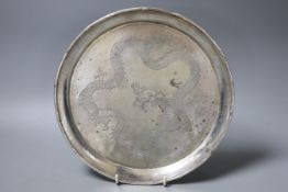 A Chinese Export white metal salver, engraved with a dragon, maker, WS, 25.9cm, 17.5oz.