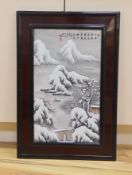 A Chinese framed porcelain plaque decorated with a winter scene, 31 cms wide x 54 cms high (not