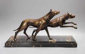 A French bronze model of two Great Danes, signed Fugere on marble base,42 cms wide