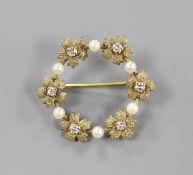 A modern 9ct gold, diamond and seed pearl set circular open work brooch, 28mm, gross weight 3.5